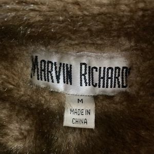 Vintage Circa 1990’s fur lined jean jacket.